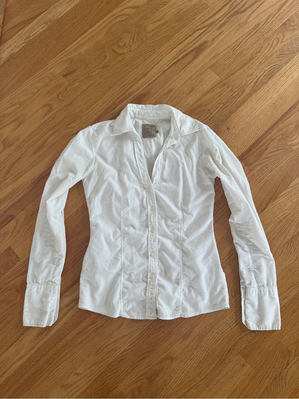 Off white button up shirt with a collar
soft fabric corduroy